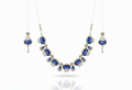 This is an elegant blue colour necklace and earring set designed with a refined, contemporary-meets-traditional appeal.