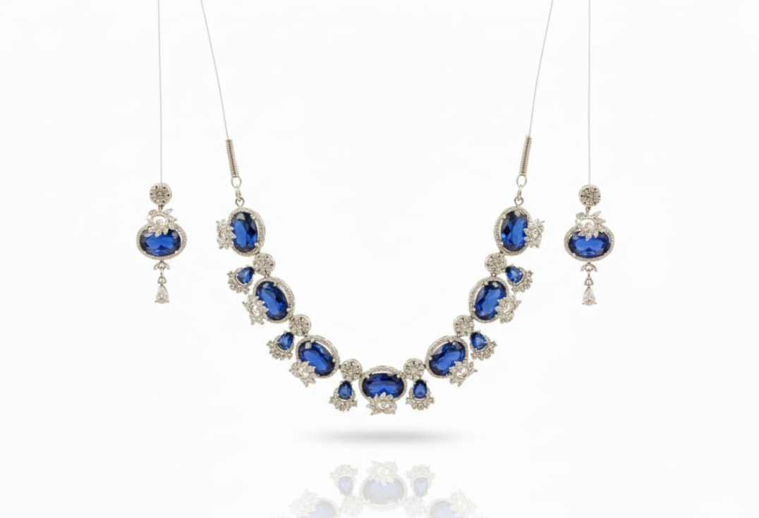 This is an elegant blue colour necklace and earring set designed with a refined, contemporary-meets-traditional appeal.
