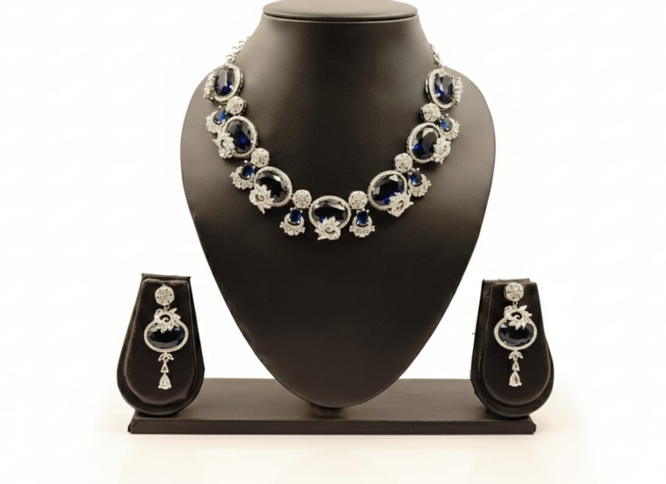 This is an elegant blue colour necklace and earring set designed with a refined, contemporary-meets-traditional appeal.